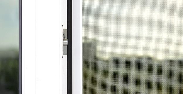 A closeup of a window lock.
