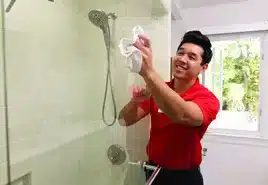 Shower glass enclosure installation and repair by Glass Doctor in a tiled bathroom