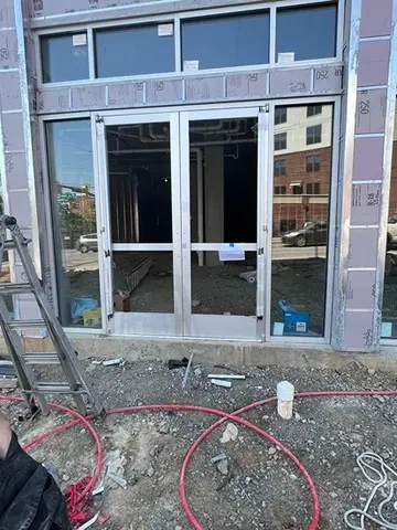 Storefront doors with glass panels installed by the service professionals at Glass Doctor of Nashville.