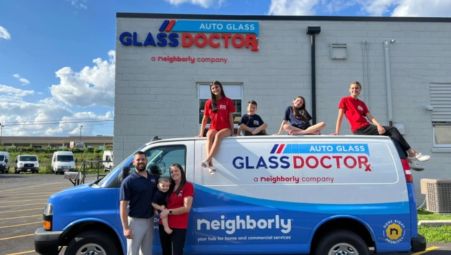 Glass Doctor of Southampton family sitting on company truck.