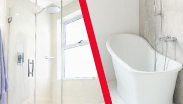 A well-equipped bathroom showcasing a shower, bathtub, and toilet, emphasizing modern design and utility.