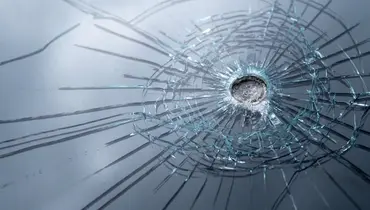 glass shattered by a bullet