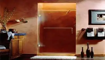 A glass shower door with a bar handle