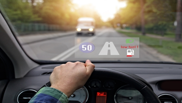 Driver view of a vehicle equipped with a heads up display system.