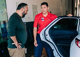 Glass Door professional talking with customer